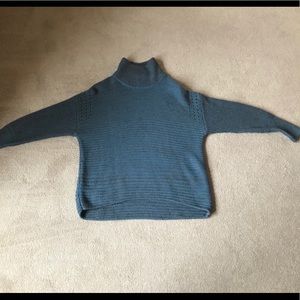 Blue Vera Wang sweater, never warm.